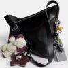 Sac messager Mott 38 en cuir patiné avec Charms