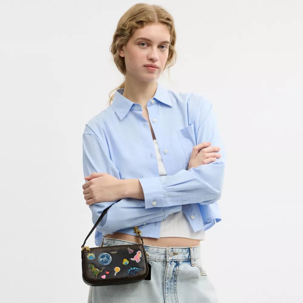 Sac « Plaza » Rexy 10e anniversaire, 18 in, en cuir patiné avec imprimé autocollants
