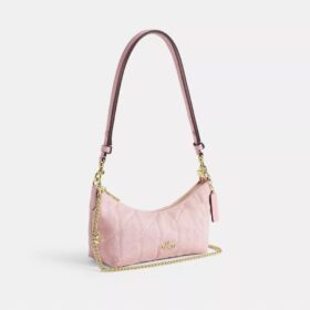 Sac porté épaule Caitlin en coton régénératif, matelassé et orné d’une breloque