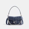 Sac porté épaule « Chain Tabby » en denim emblématique
