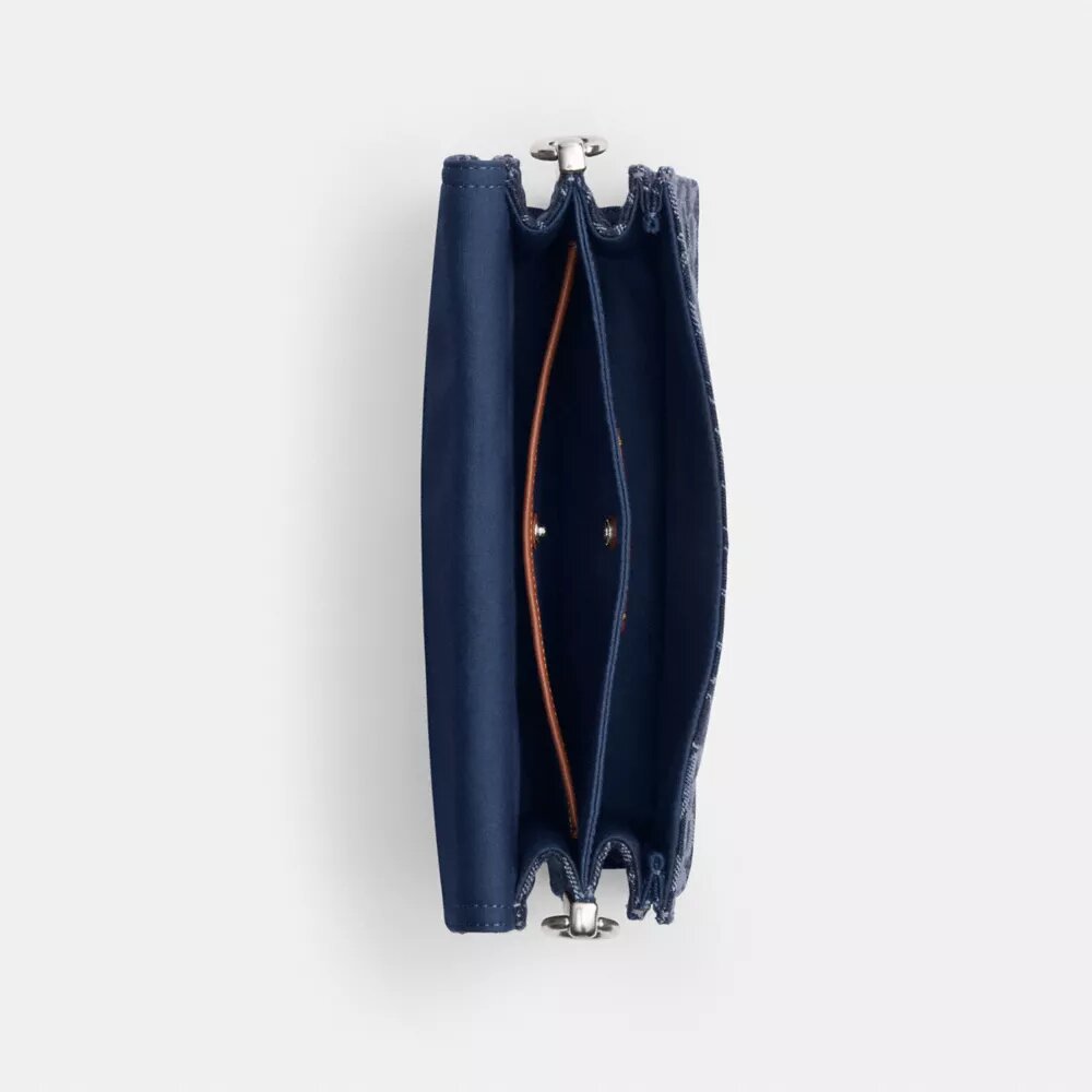 Sac porté épaule « Chain Tabby » en denim emblématique