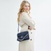 Sac porté épaule « Chain Tabby » en denim emblématique