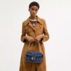 Sac porté épaule « Chain Tabby » en denim emblématique