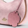 Sac porté épaule Emily en Signature Canvas avec Charms