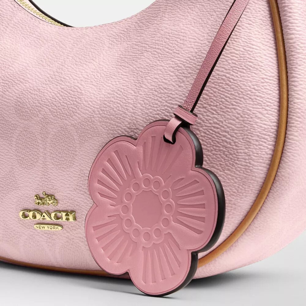 Sac porté épaule Emily en Signature Canvas avec Charms