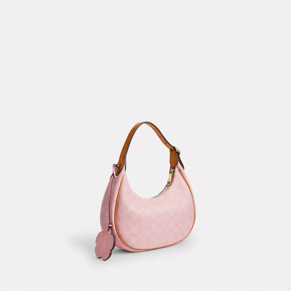 Sac porté épaule Emily en Signature Canvas avec Charms