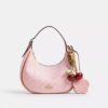 Sac porté épaule Emily en Signature Canvas avec Charms