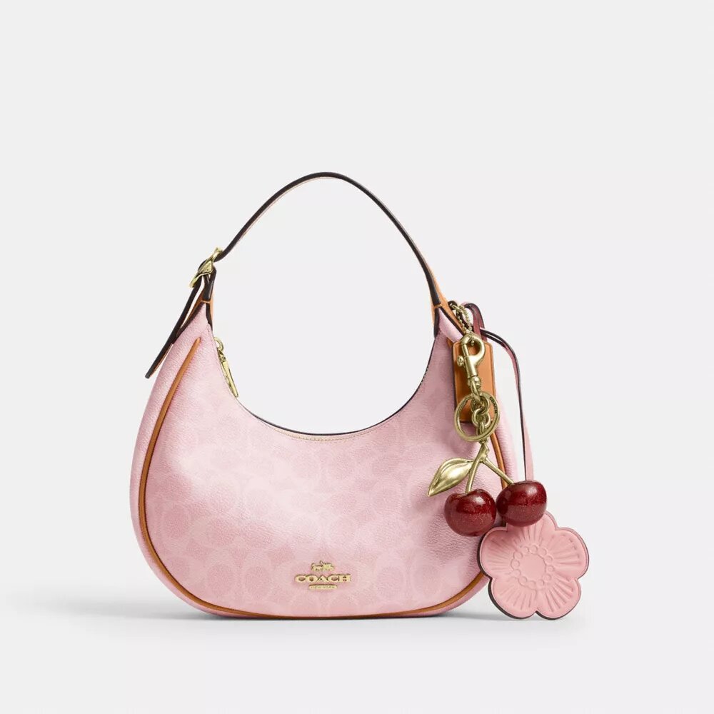 Sac porté épaule Emily en Signature Canvas avec Charms