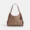 Sac porté épaule Erin en Signature Canvas