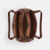 Sac porté épaule Erin en Signature Canvas