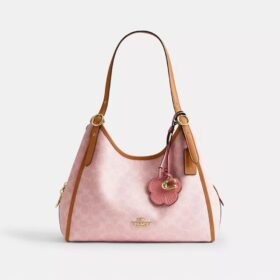 Sac porté épaule Erin en Signature Canvas avec Charms