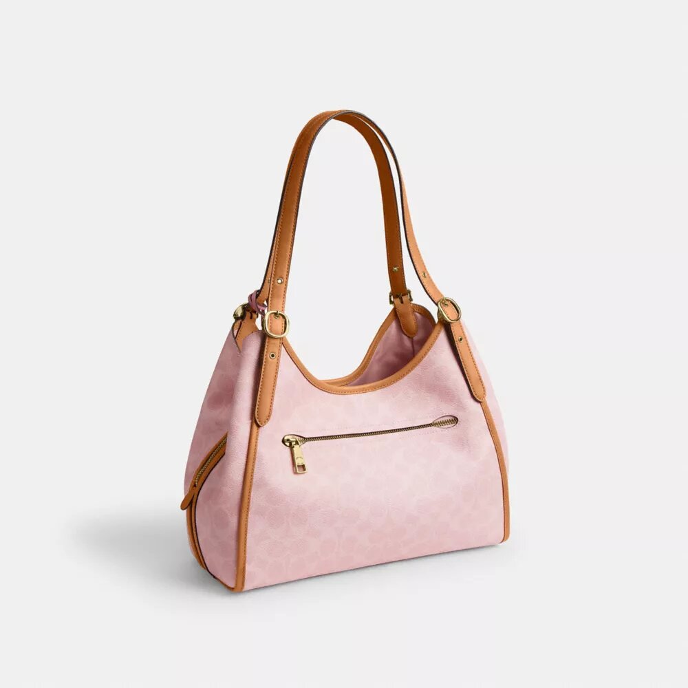 Sac porté épaule Erin en Signature Canvas avec Charms