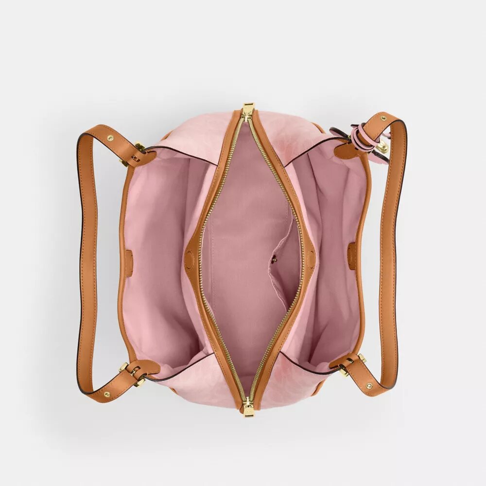 Sac porté épaule Erin en Signature Canvas avec Charms