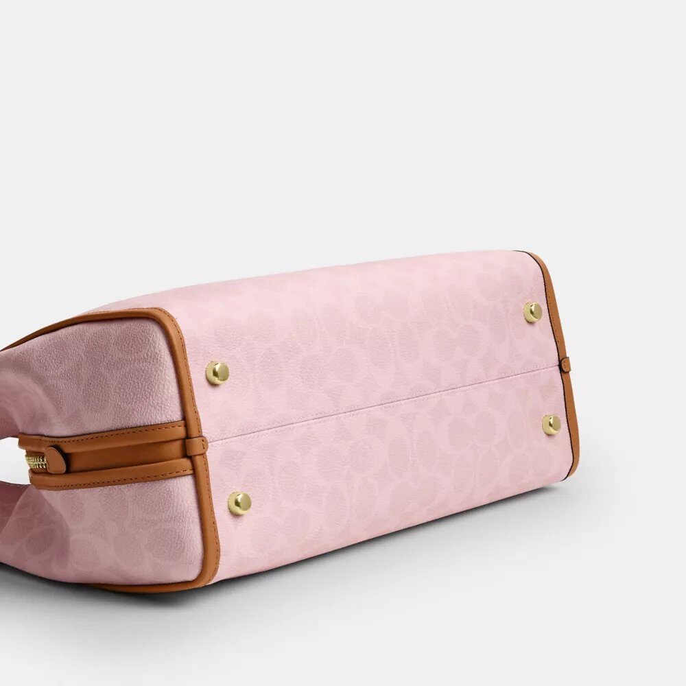 Sac porté épaule Erin en Signature Canvas avec Charms