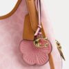 Sac porté épaule Erin en Signature Canvas avec Charms