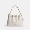 Sac porté épaule Evelyn matelassé avec breloque