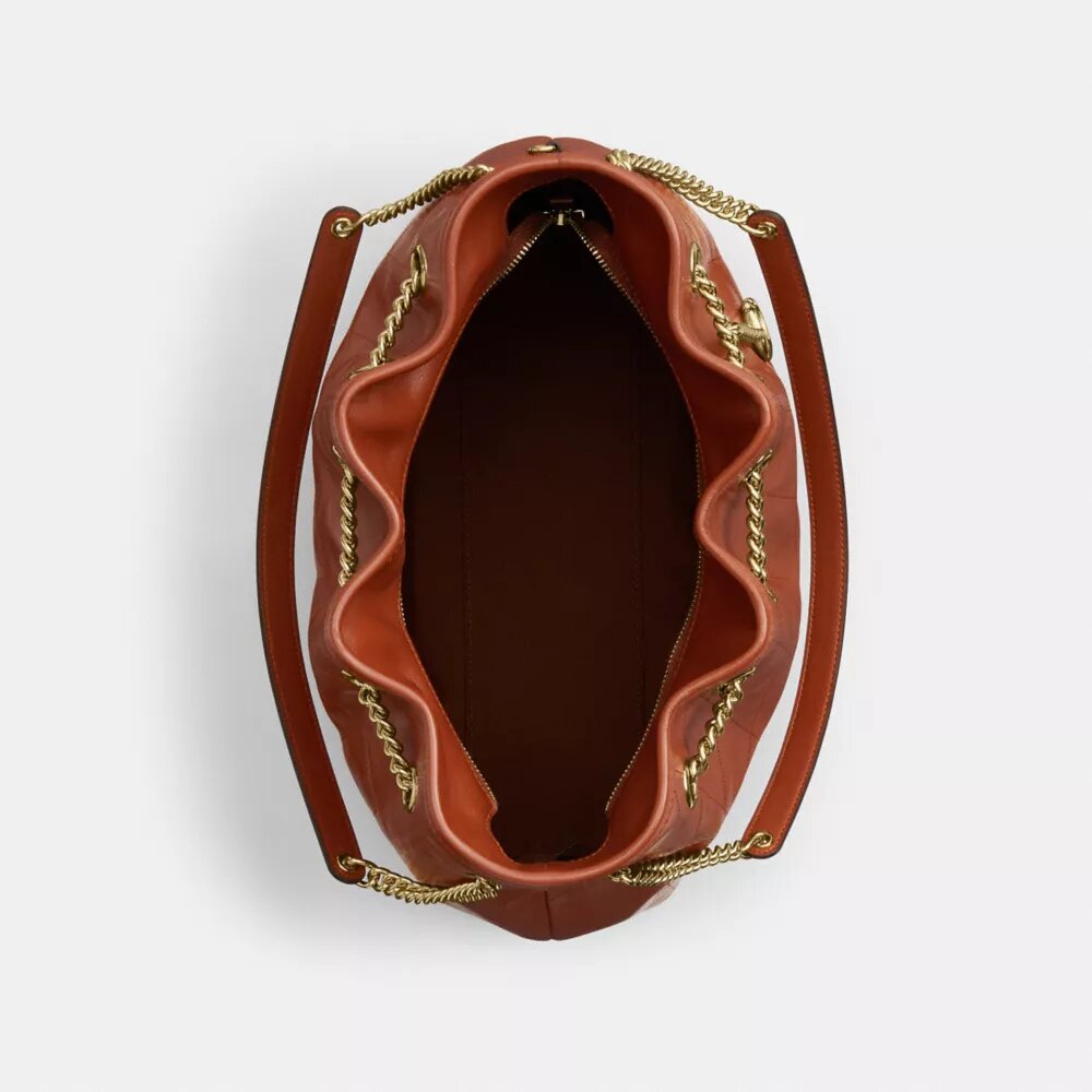 Sac porté épaule Evelyn matelassé avec breloque