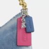 Sac porté épaule Laurel en denim « Loved » avec Charms