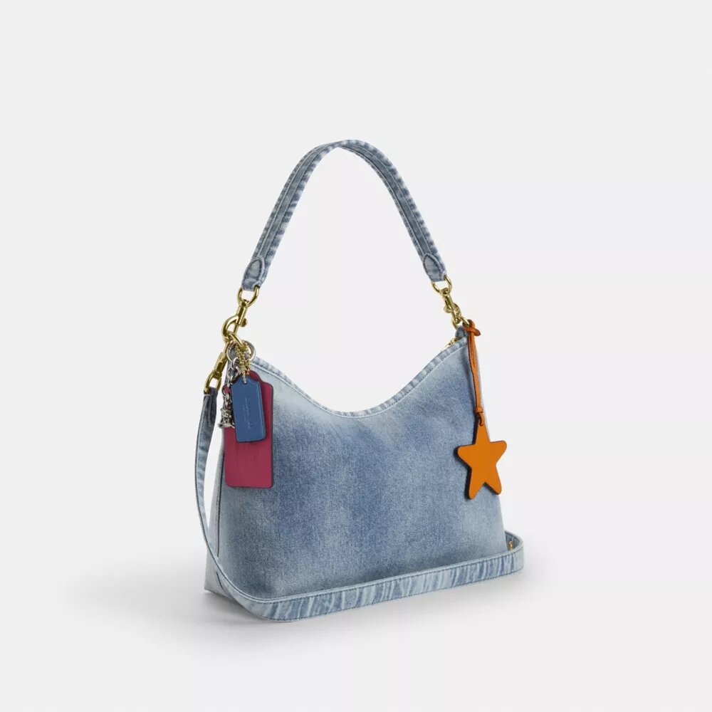 Sac porté épaule Laurel en denim « Loved » avec Charms