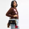 Sac porté épaule Tabby 26 avec Charms