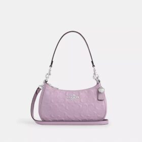 Sac porté épaule Teri en cuir signature avec breloque en forme de cœur