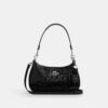 Sac porté épaule Teri en cuir Signature avec breloque en forme de cœur