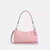 Sac porté épaule Teri en cuir signature avec breloque en forme de cœur