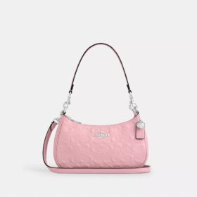 Sac porté épaule Teri en cuir signature avec breloque en forme de cœur