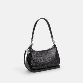 Sac porté épaule Teri en cuir Signature avec breloque en forme de cœur