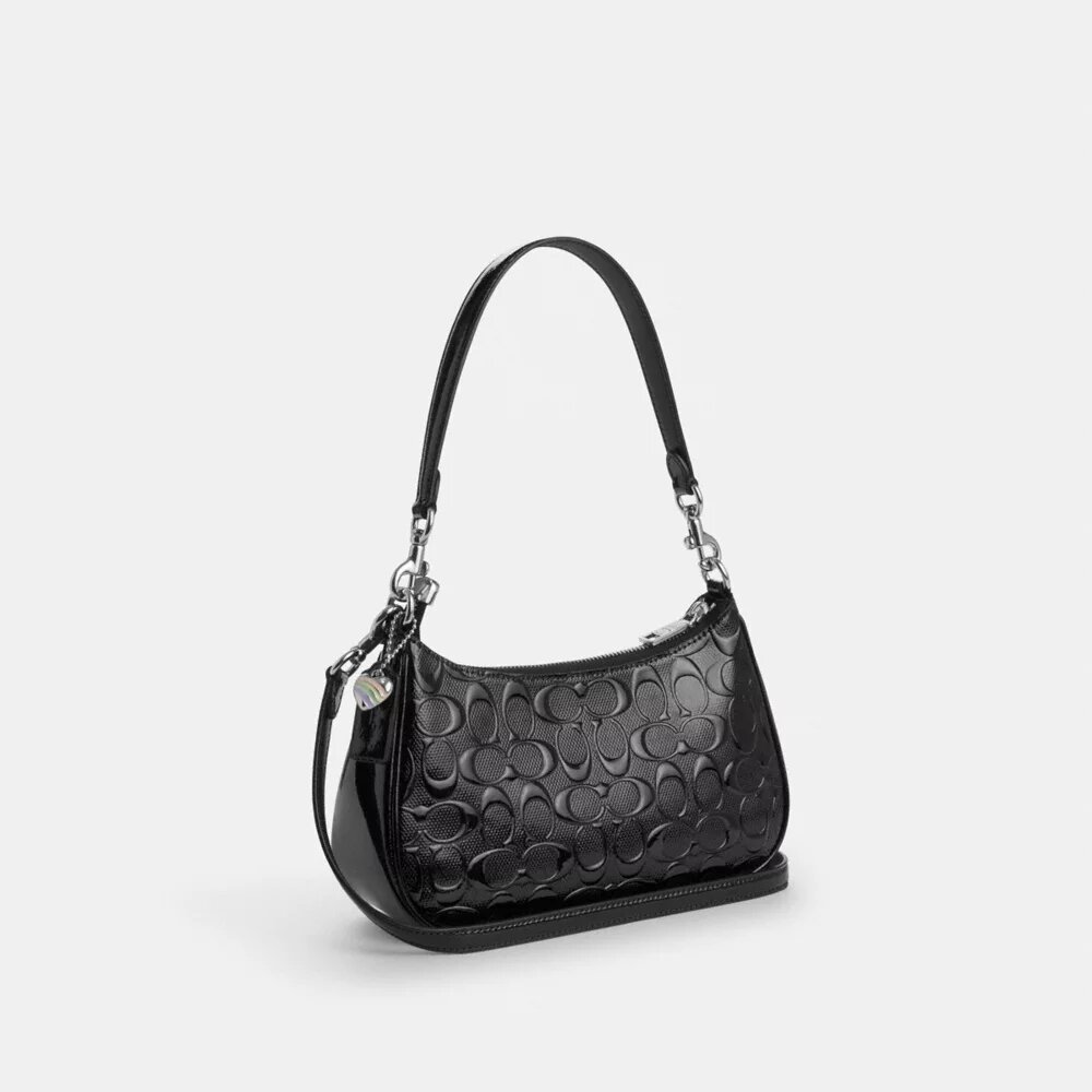 Sac porté épaule Teri en cuir Signature avec breloque en forme de cœur