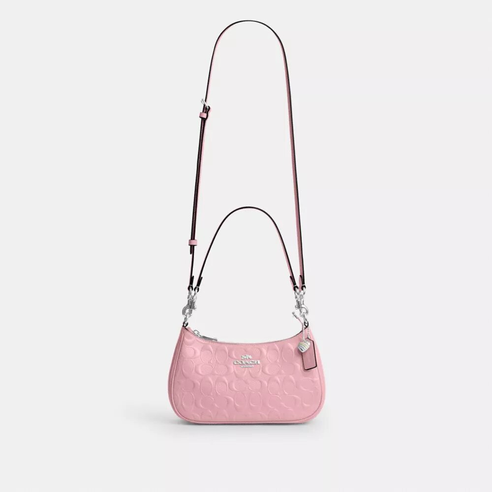 Sac porté épaule Teri en cuir signature avec breloque en forme de cœur