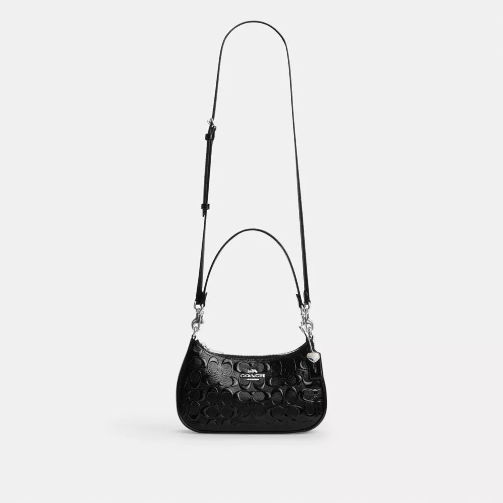 Sac porté épaule Teri en cuir Signature avec breloque en forme de cœur