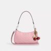 Sac porté épaule Teri en cuir signature avec breloque en forme de cœur
