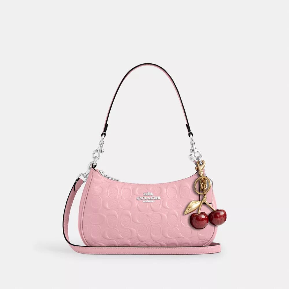 Sac porté épaule Teri en cuir signature avec breloque en forme de cœur
