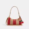 Sac porté épaule Teri à rayures et breloque