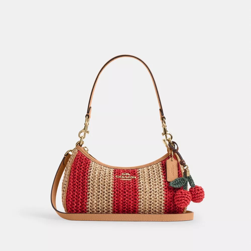 Sac porté épaule Teri à rayures et breloque