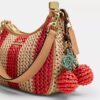 Sac porté épaule Teri à rayures et breloque