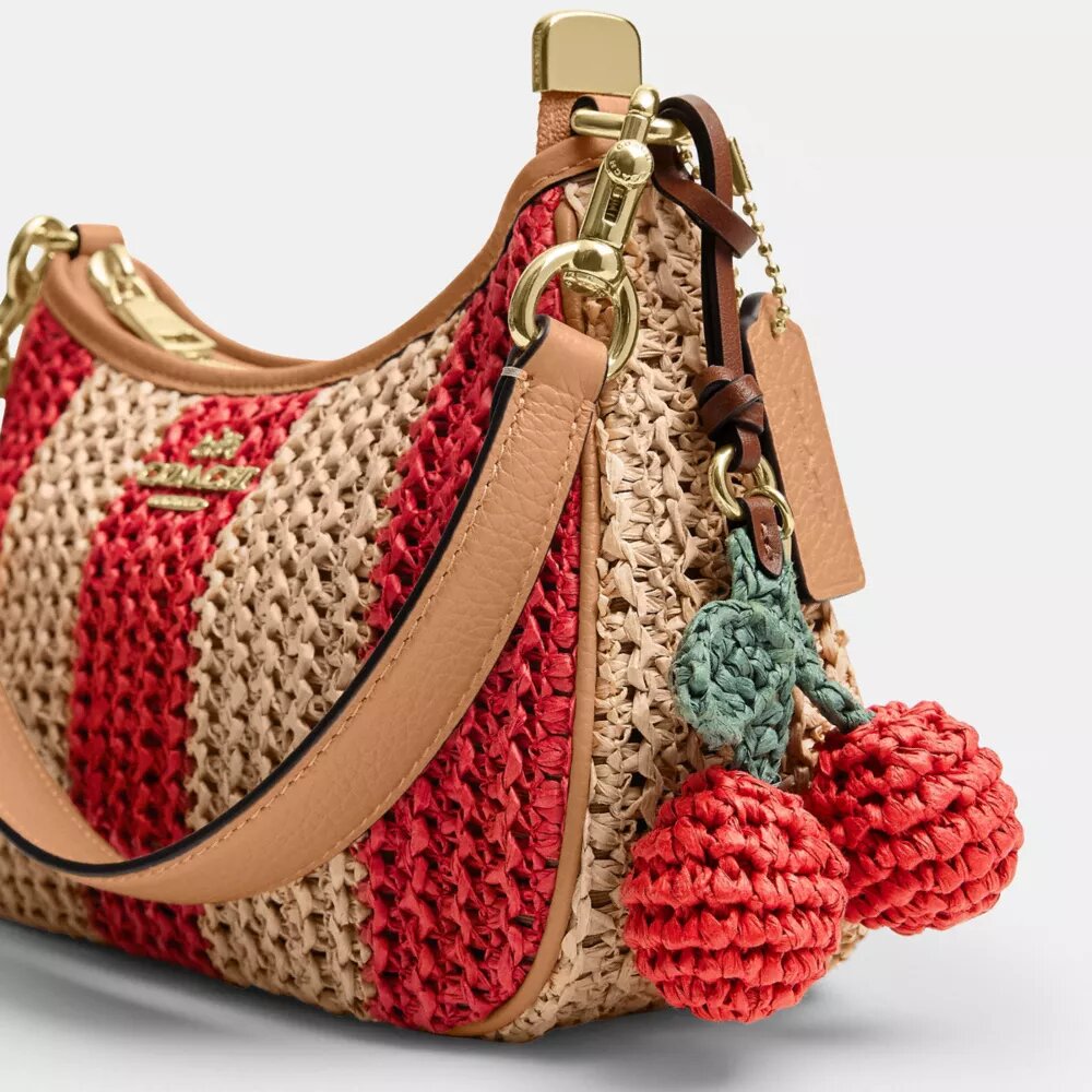 Sac porté épaule Teri à rayures et breloque