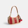 Sac porté épaule Teri à rayures et breloque