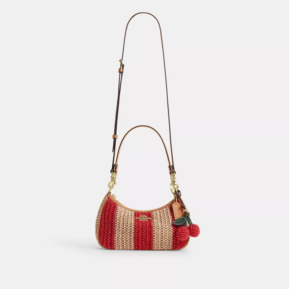 Sac porté épaule Teri à rayures et breloque