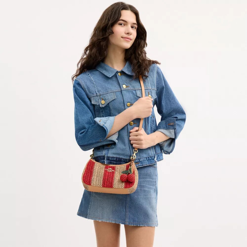 Sac porté épaule Teri à rayures et breloque