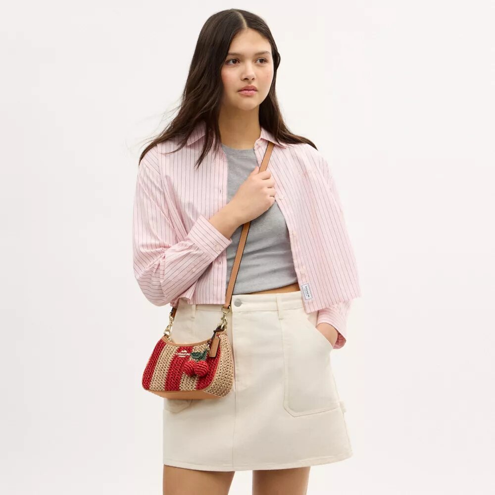 Sac porté épaule Teri à rayures et breloque