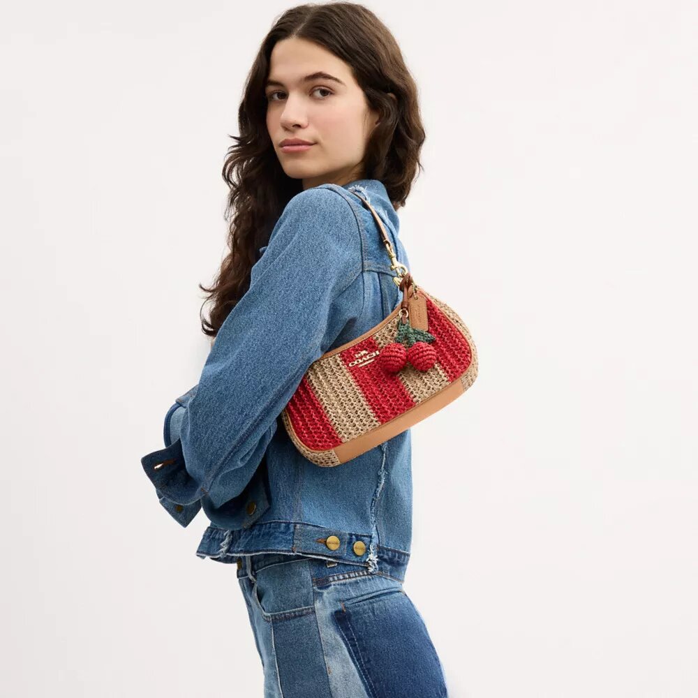 Sac porté épaule Teri à rayures et breloque