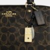 Sac Rowan en Signature Canvas avec Charms