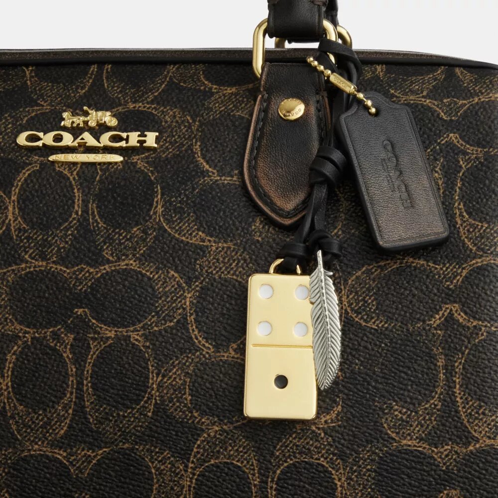 Sac Rowan en Signature Canvas avec Charms
