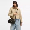 Sac Rowan en Signature Canvas avec Charms