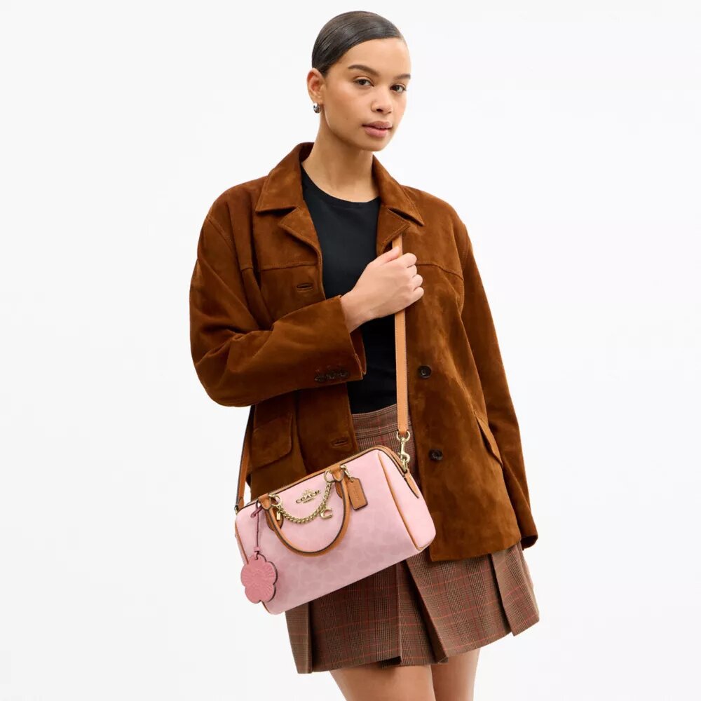 Sac Rowan en Signature Canvas avec Charms
