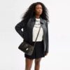 Sac Rowan en Signature Canvas avec Charms