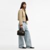 Sac Rowan en Signature Canvas avec Charms
