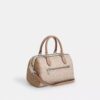 Sac satchel Rowan en Signature Canvas à motifs géométriques